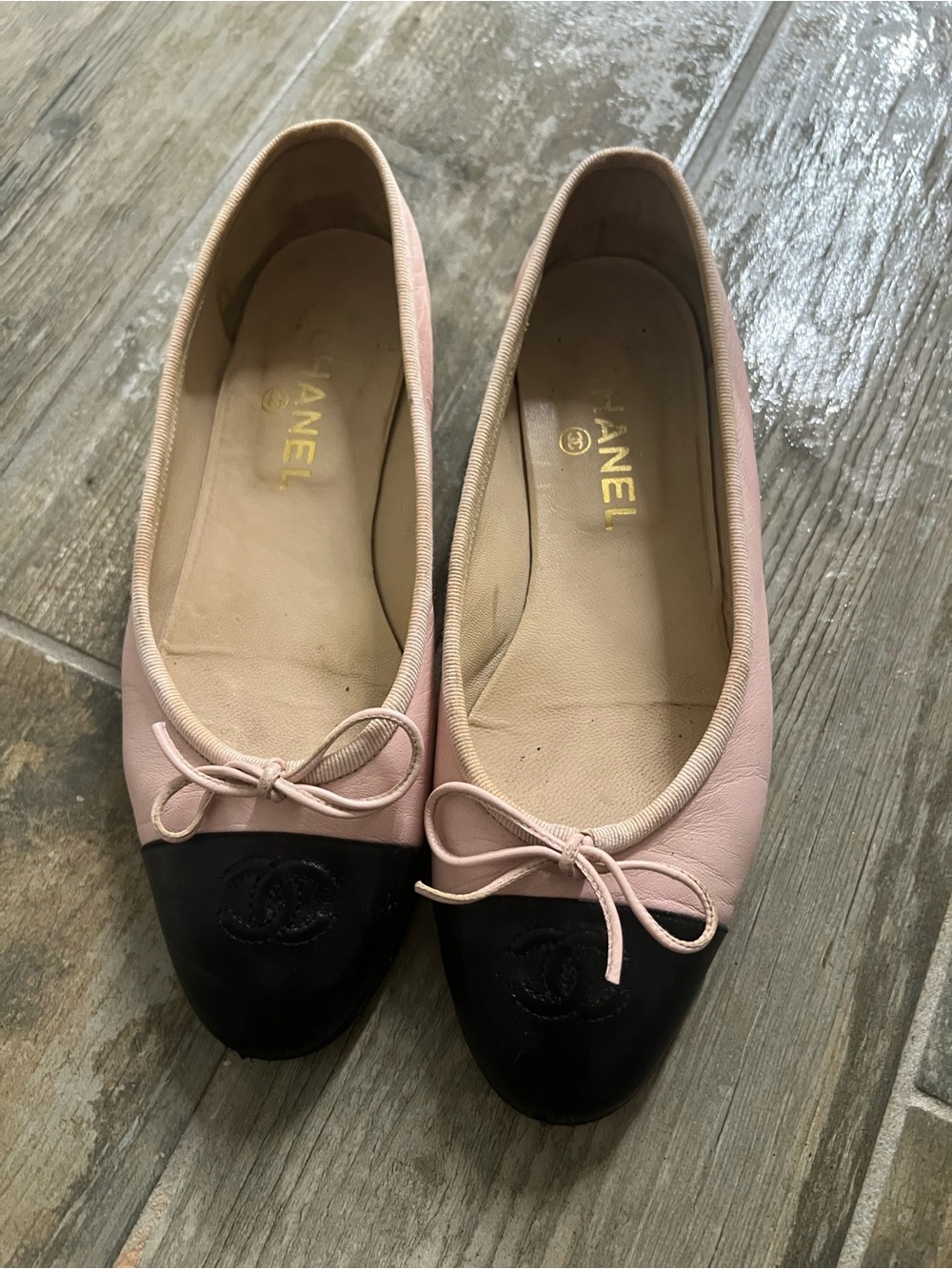 CHANEL Pink and Black Leather Cap-Toe Ballet Flats